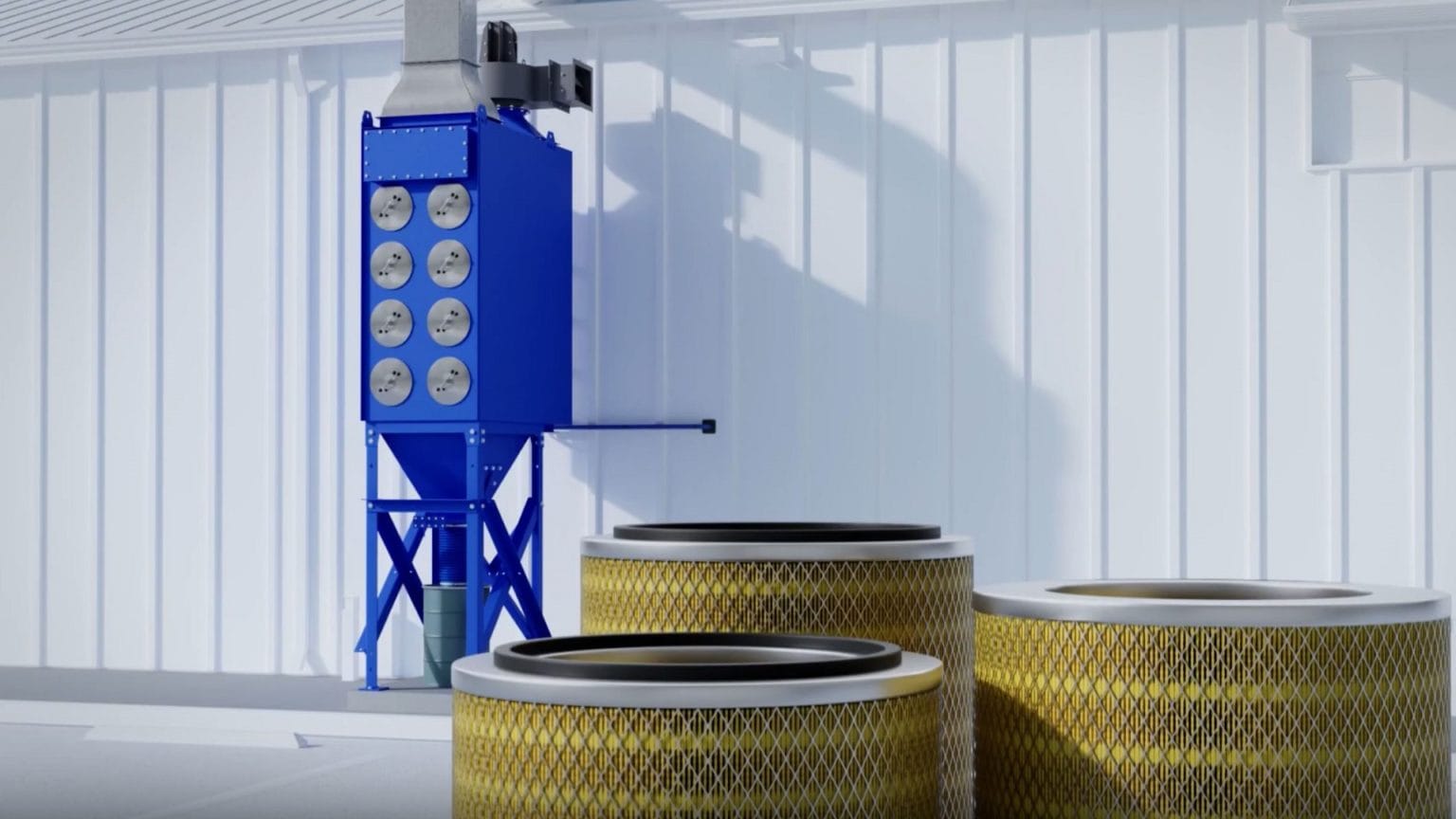 Industrial cartridge dust collector in the background with cartridge filters in the foreground